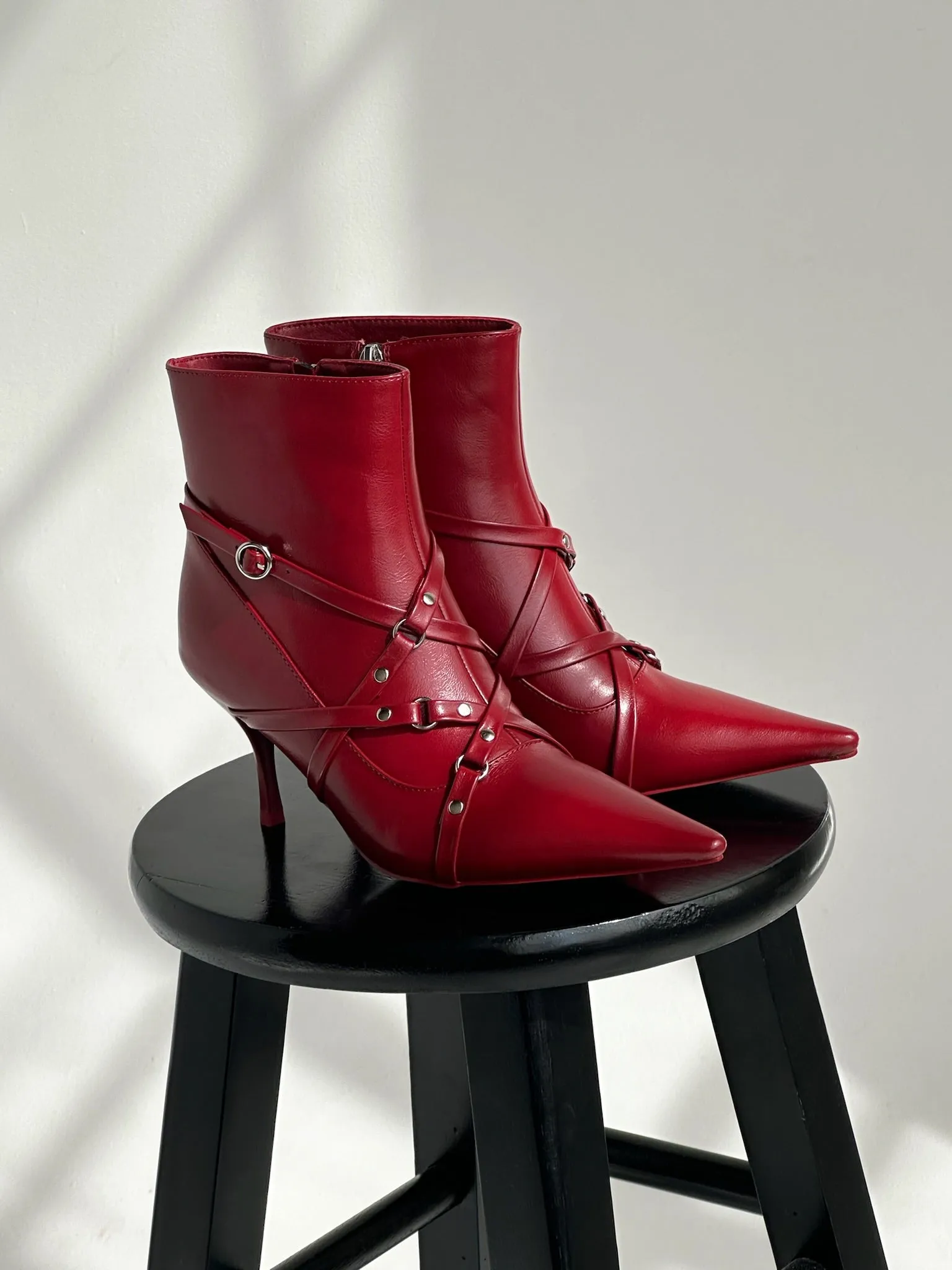 PURNIMA-RED STRAPPY POINTED TOE BOOTIE